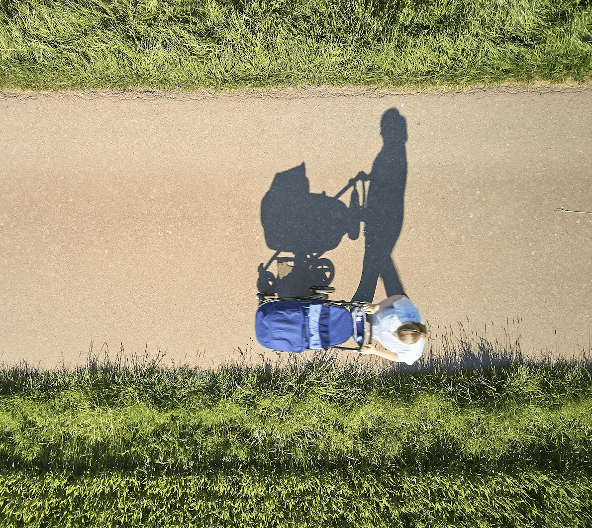 image of a lady pushing a stroller